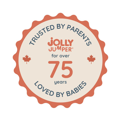 Baby using The Original Jolly Jumper Baby Exerciser with door clamp, featuring colorful fabric and secure door attachment for active play.