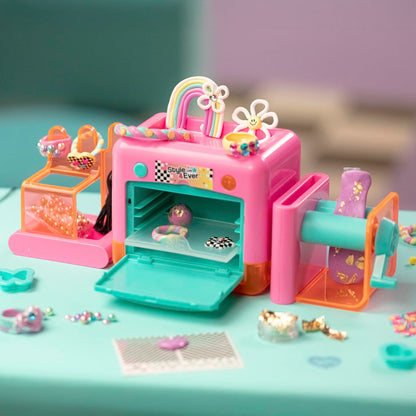 Canal Toys Style 4 Ever Magic Clay Jewellery Factory kit with machine, clay, and accessories for creating rings, bracelets, and charms.