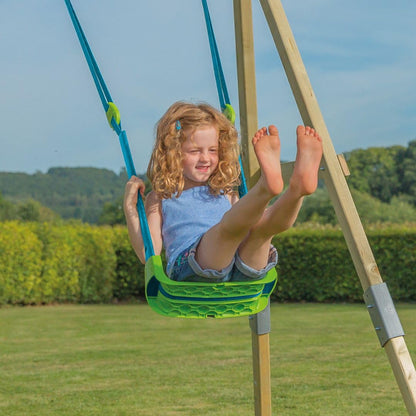 Green TP Toys Quadpod 4-in-1 growable outdoor baby swing seat with adjustable ropes and safety strap for toddlers and kids.