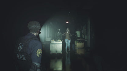 Resident Evil 2 PlayStation 5 game case with cover art featuring zombie and character illustrations by Capcom.