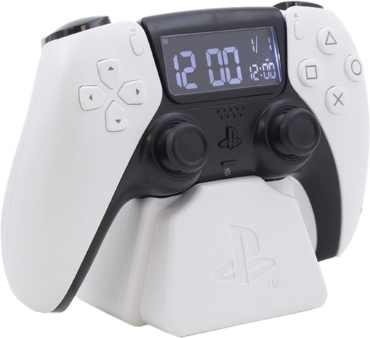 White PlayStation PS5 controller alarm clock by Paladone with digital display, date, and gaming-themed bedroom decor accessory