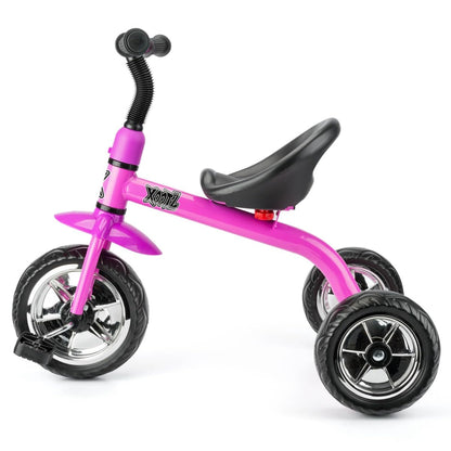 Pink Xootz tricycle for kids, featuring an easy clip design and portable frame, shown in a sunny outdoor setting.
