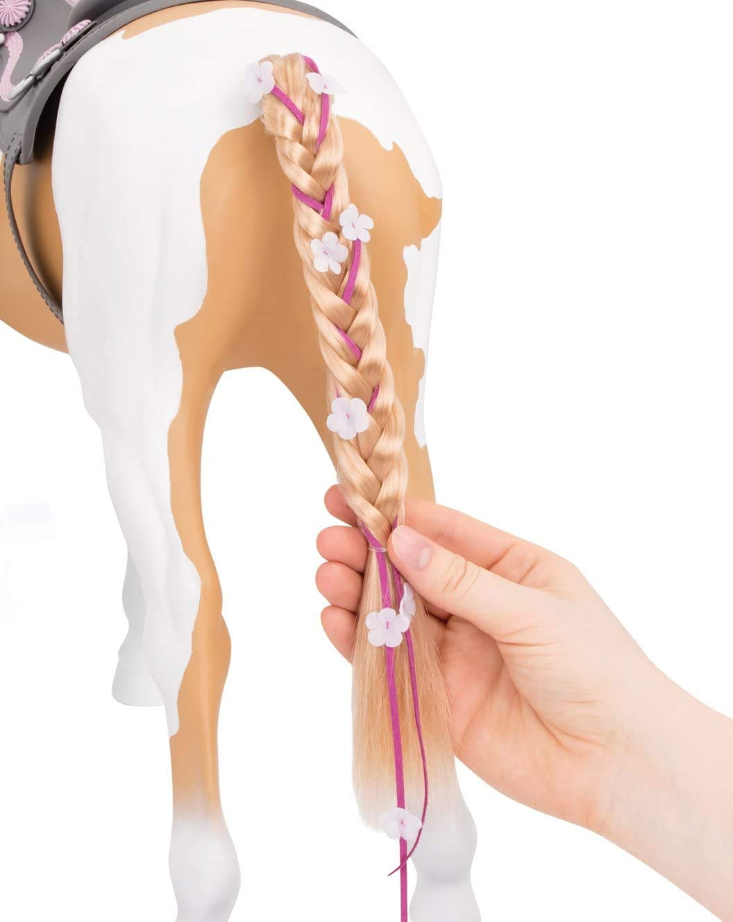 Our Generation Palomino Pain Hair Kids Toy Play Horse with bridle, brush, ribbons, hair extension, and western saddle in beige and white.