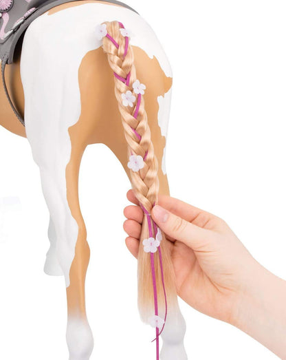 Our Generation Palomino Pain Hair Kids Toy Play Horse with bridle, brush, ribbons, hair extension, and western saddle in beige and white.