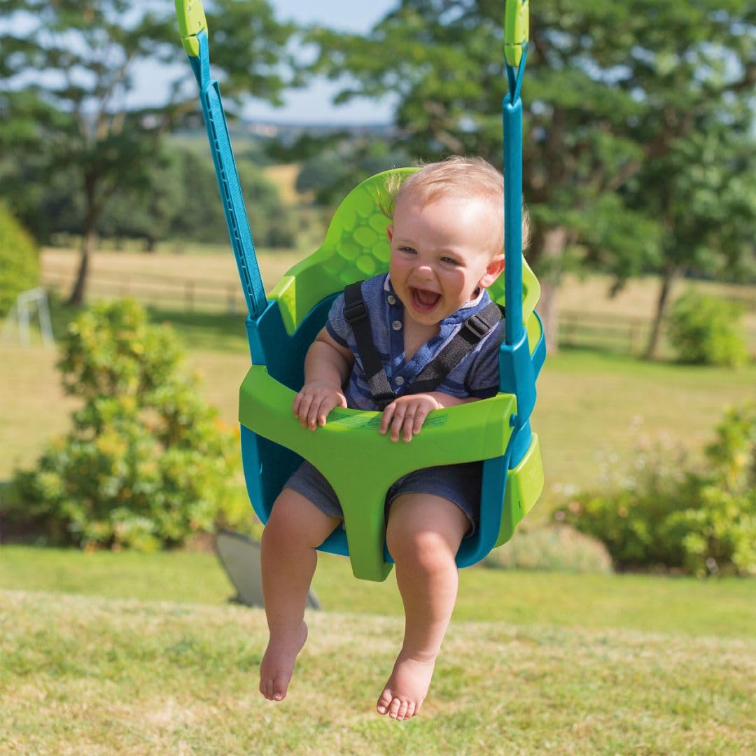 Green TP Toys Quadpod 4-in-1 growable toddler swing with adjustable ropes and safety strap, suitable for ages 6 months to 8 years.