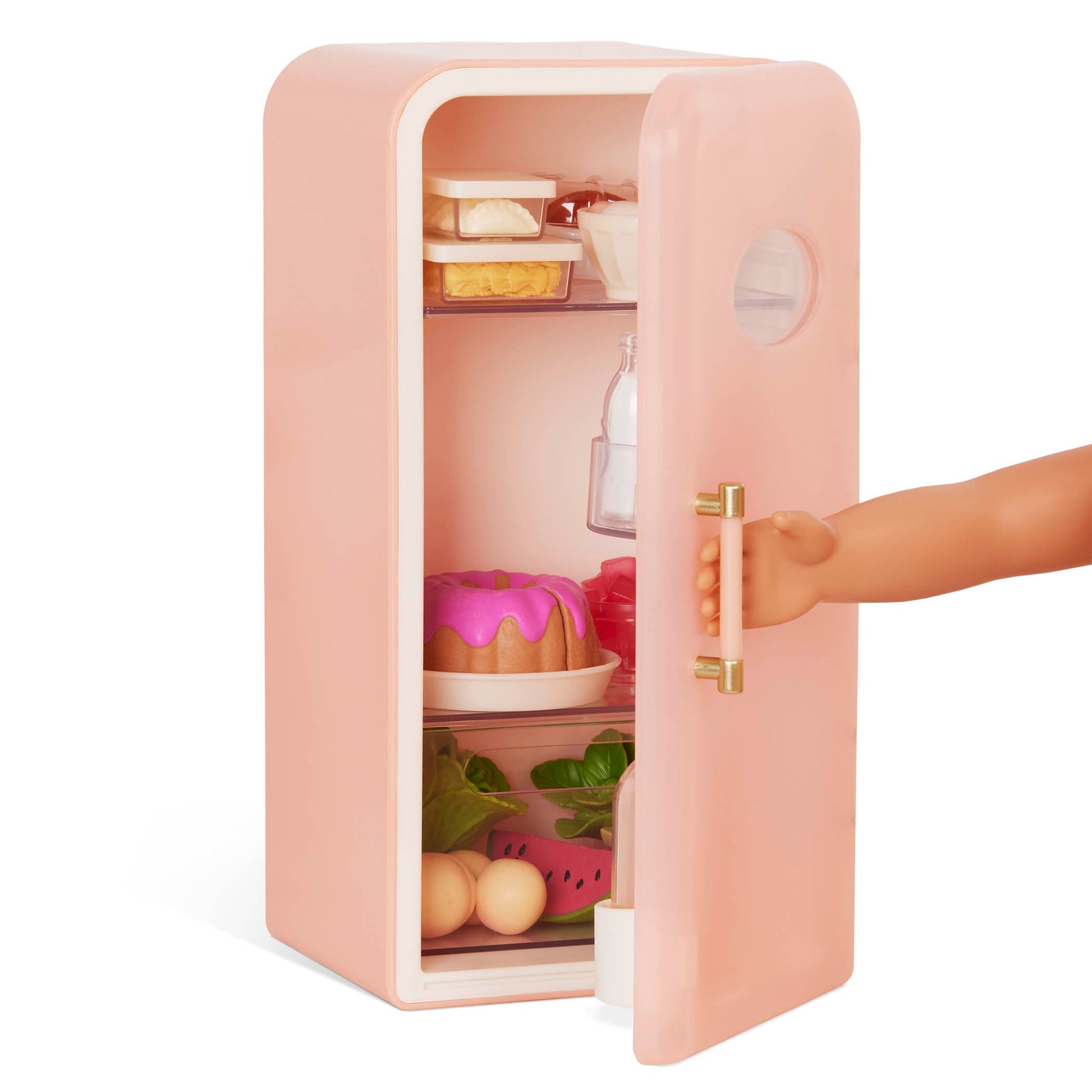 Our Generation pink mini fridge with play food accessories for dolls, featuring realistic design and 46cm size.