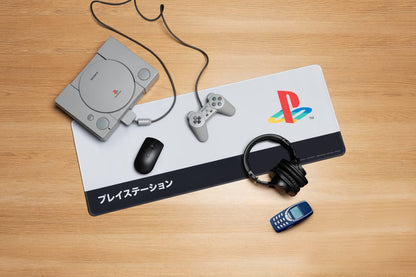 PlayStation Heritage desk mat by Paladone featuring official Sony gaming logo, non-slip surface, large wipe-clean mouse pad for gaming setup.