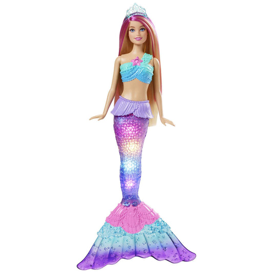 Mermaid Barbie doll with pink-streaked hair and light-up tail, showcasing water-activated features in a colorful setting.