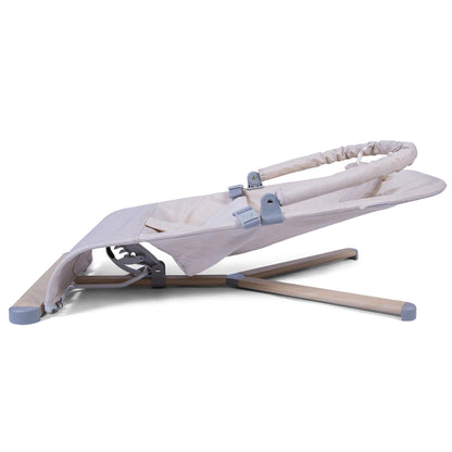 Red Kite Baya Bouncer in oatmeal color with a toy bar, ergonomic and adjustable baby bouncer designed for comfort and entertainment.