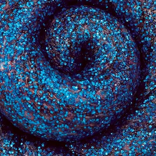 Mini tin of Crazy Aaron's Coral Reef Putty, colorful silicone fidget toy with vibrant coral and teal hues for stress relief and sensory play.