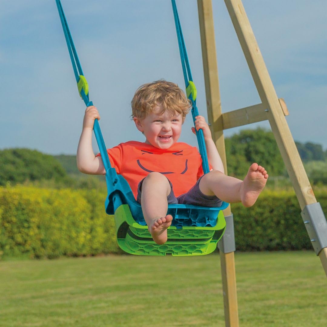 Green TP Toys Quadpod 4-in-1 growable toddler swing seat with adjustable ropes and safety strap, suitable for outdoor gardens and playgrounds.