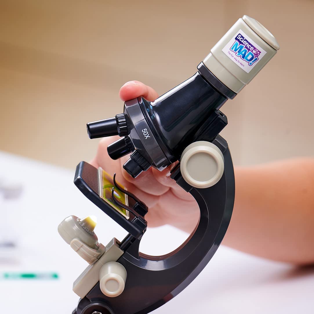 Science Mad microscope and telescope combo set for kids showing a 15x telescope on tripod and a 100x microscope with colorful accessories.