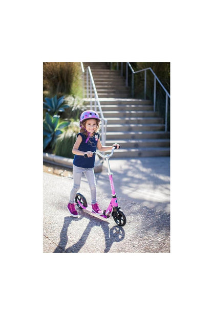 Pink Micro Cruiser LED children's scooter with adjustable handlebar, foldable design, and light-up wheels for ages 5-12.