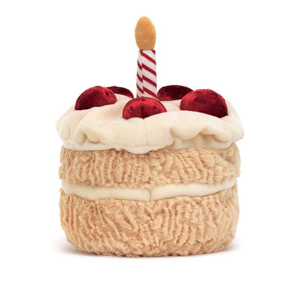 Amuseable Birthday Cake plush decoration by Jellycat, featuring a smiling face and colorful frosting details.