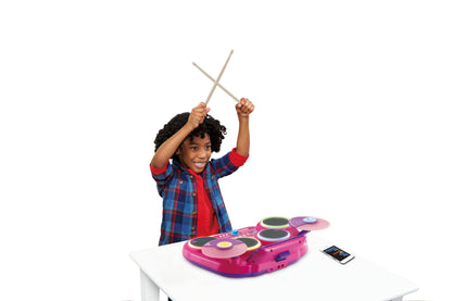 VTech Kidi DJ Drums pink electronic drum kit for kids with 4 drums, cymbals, drumsticks, Bluetooth, and light-up features.