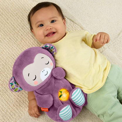 Fisher-Price Baby Soothe ‘n Snuggle Purple Monkey plush toy with built-in sound machine, lights, and breathing motion for newborns.