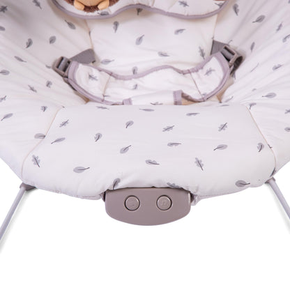 Red Kite Cozy Bounce musical baby bouncer with woodland walk design, featuring soft fabric and attached toy for infant comfort.
