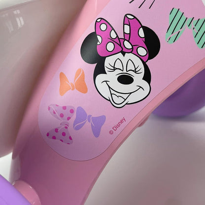 Pink Disney Minnie Mouse kids tricycle for toddlers with front and back storage baskets, designed for children aged 1-3 years.