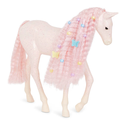 Our Generation Elara doll with pink hair and foal in lilac jumpsuit, featuring hairstyling accessories for play.