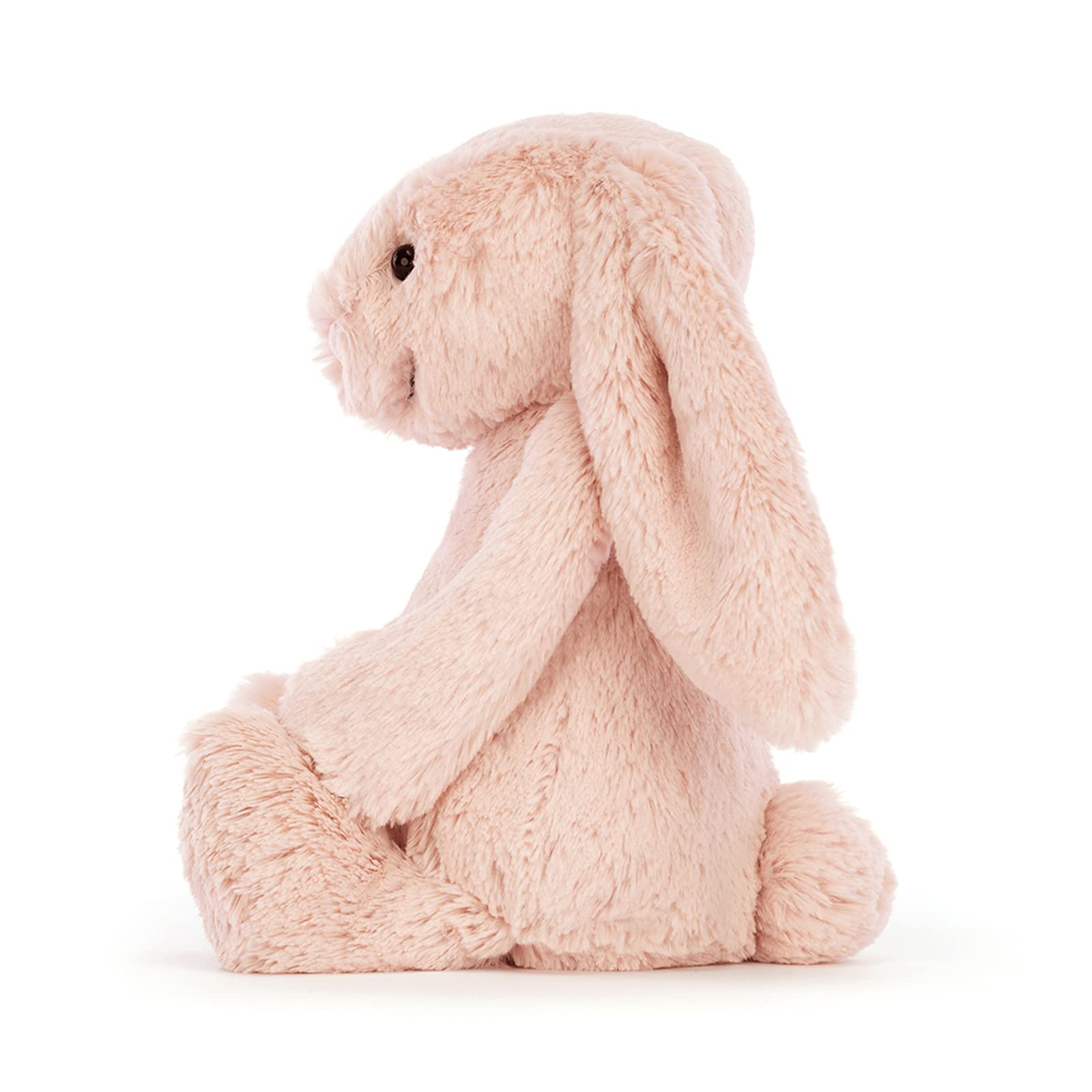 Jellycat Bashful Blush Bunny Plush sitting upright with soft, pink fur and long floppy ears.
