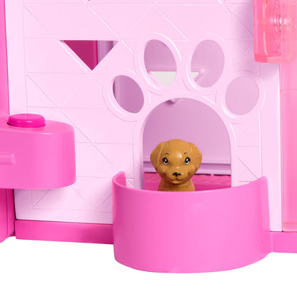 Barbie Dreamhouse 3-storey toy house with pool, slide, elevator, and accessories for imaginative play.