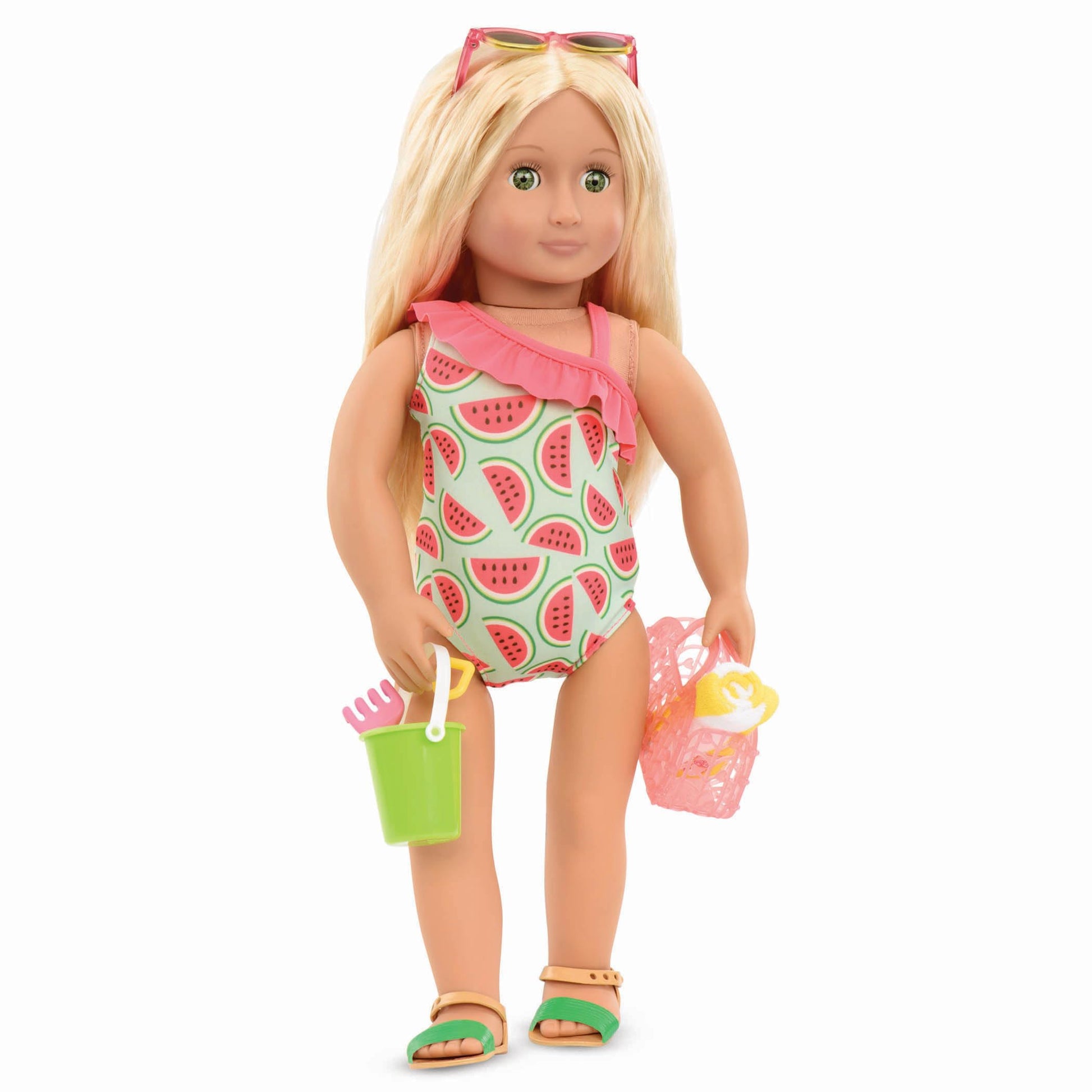 Colourful swimsuit outfit and beach toys for 18-inch dolls from Our Generation, featuring 11 beach day accessories.