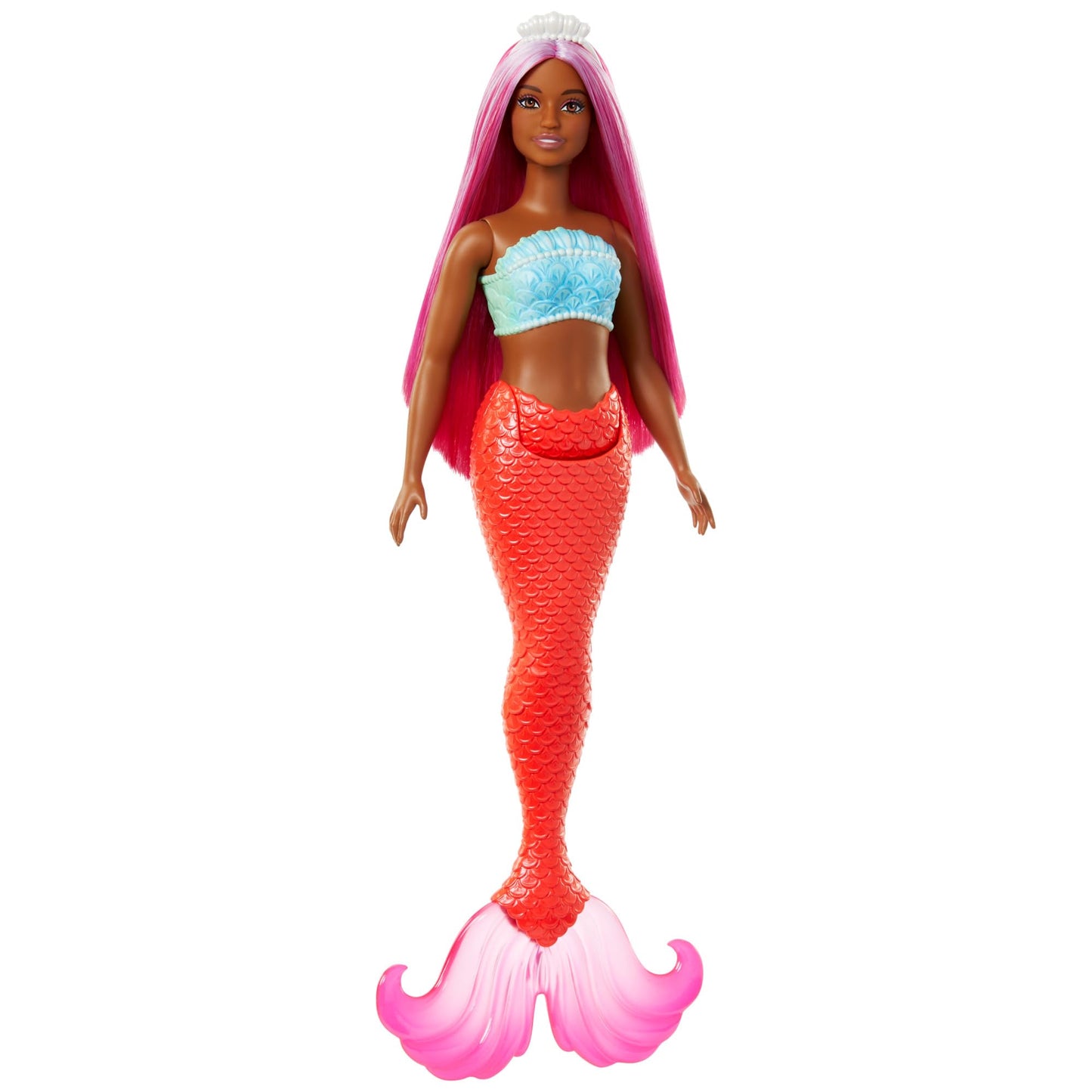 Barbie mermaid doll with magenta hair, shell bodice, tropical red tail, and headband accessory in a vibrant pose.