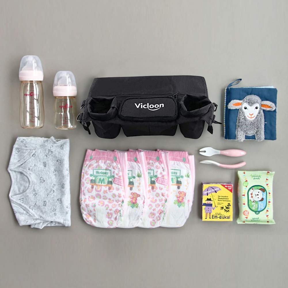 Black Vicloon baby stroller organizer with bottle holder, zippered pocket, and adjustable straps attached to a stroller.