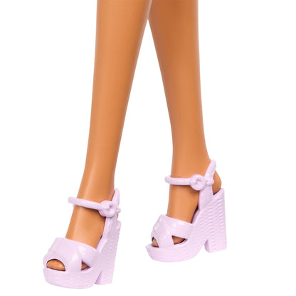 Barbie Fashionistas Doll #228 in pink top and ruffled skirt, holding a cane and wearing sunglasses.