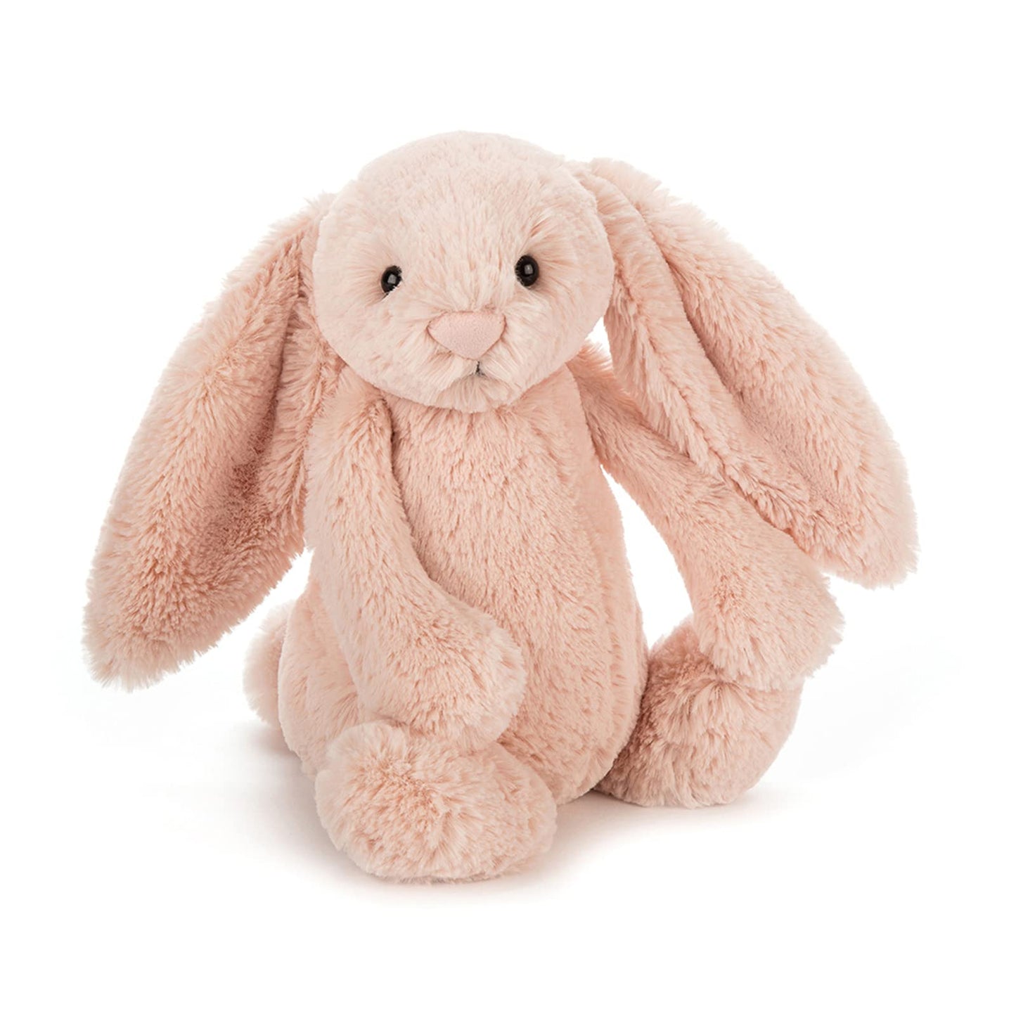 Bashful Blush Bunny plush toy by Jellycat with soft pink fur and floppy ears, sitting upright against a white background.