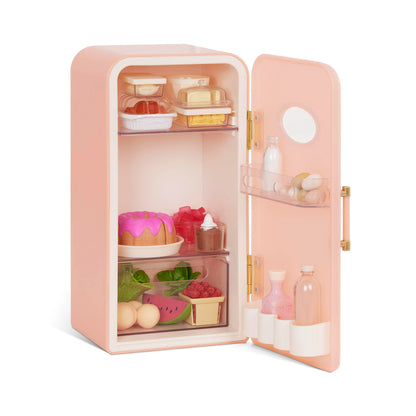 Pink Our Generation mini fridge with play food accessories for 46cm dolls, showcasing realistic details and vibrant colors.