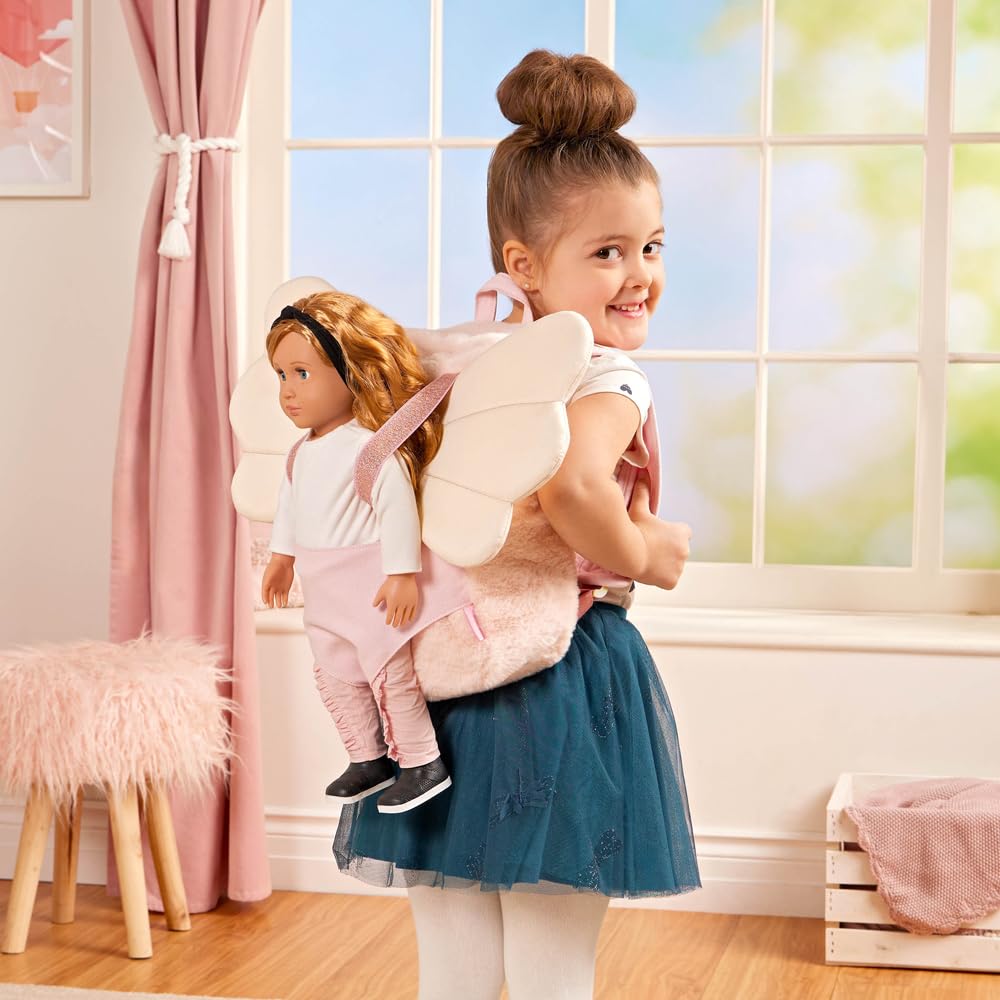 Our Generation pink doll carrier backpack with adjustable straps and storage pockets for 18-inch dolls.