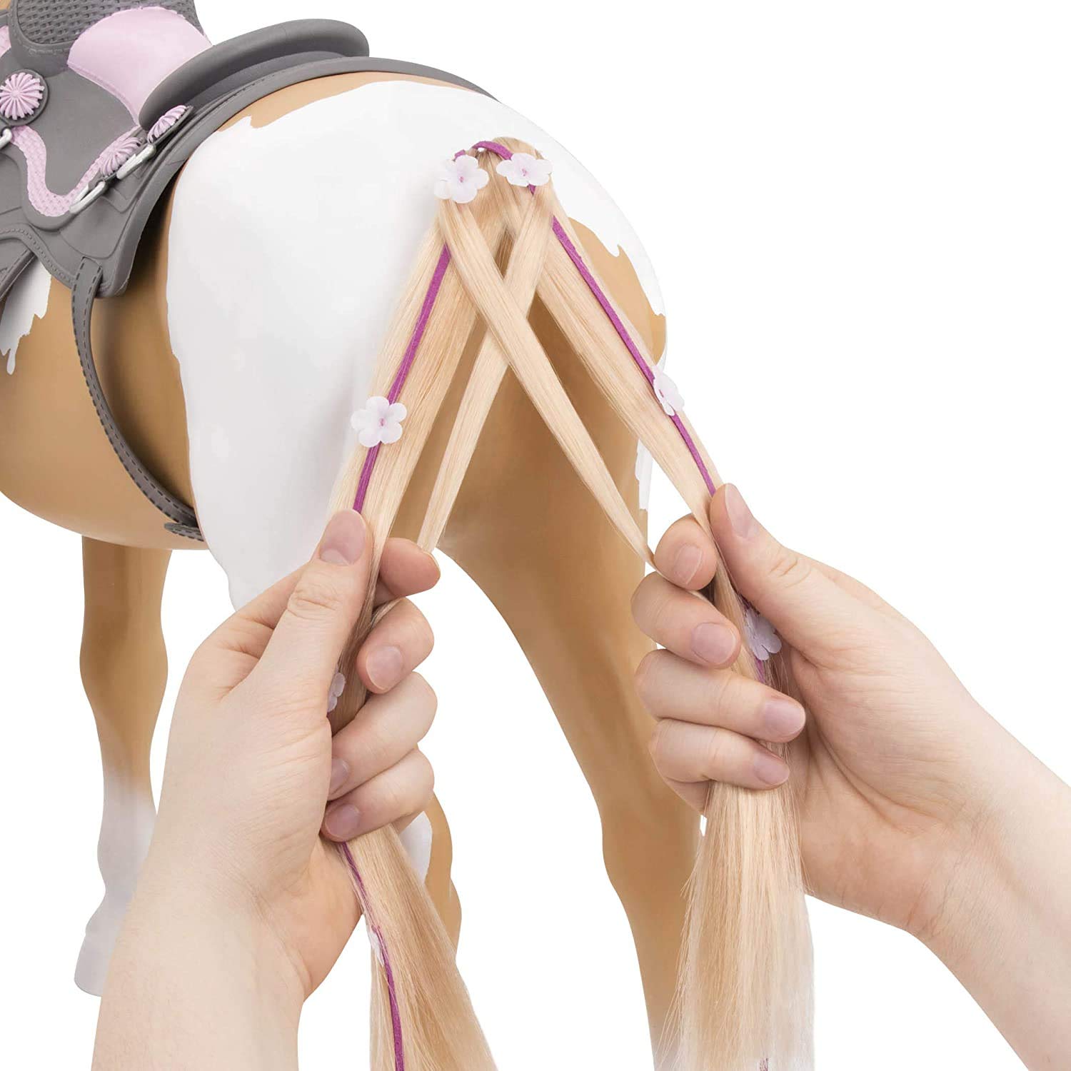 Our Generation Palomino Pain Hair Kids Toy Play Horse with bridle, hair brush, ribbons, green extension, and western saddle.