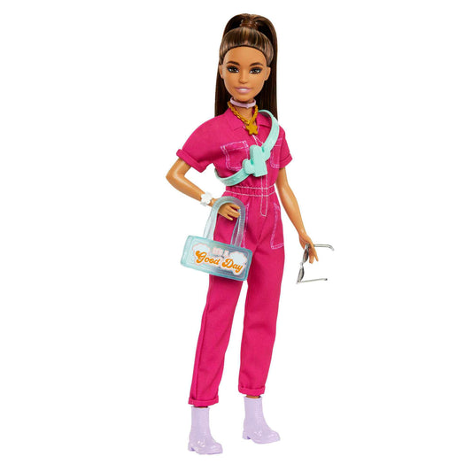 Barbie doll in a trendy pink jumpsuit with storytelling accessories and a pet puppy, featuring brown hair in a high ponytail.