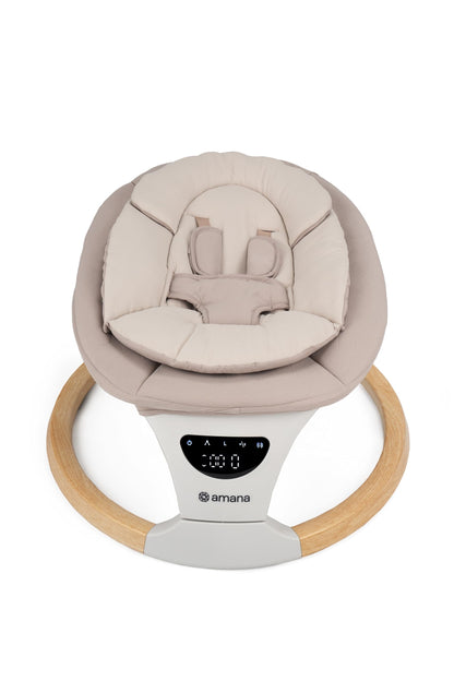 DreamX E-Swing Baby Swing in Dune with pebble grey accents, Bluetooth, remote control, and five adjustable speeds.