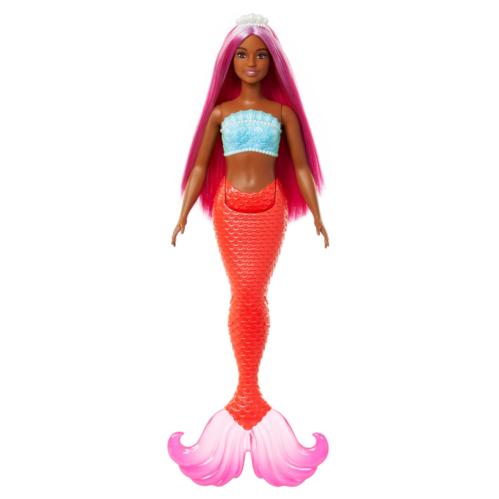 Barbie mermaid doll with magenta hair, shell bodice, tropical red tail, and headband accessory, showcasing curvy body type.