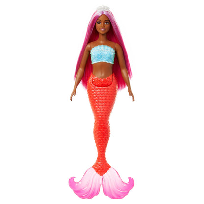 Barbie mermaid doll with magenta hair, shell bodice, tropical red tail, and headband accessory, showcasing curvy body type.