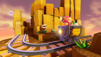 Nintendo Captain Toad Treasure Tracker game for Nintendo Switch, showing colorful game cover art with Toad character in a treasure-filled setting.