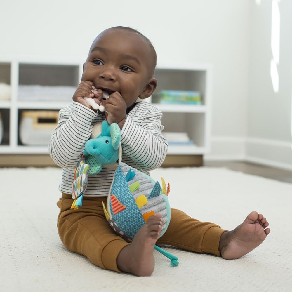 Infantino Go Gaga Playtime Pal hot air balloon toy clipped to a pram, featuring sensory elements, mirror, teether, and clacker for newborns