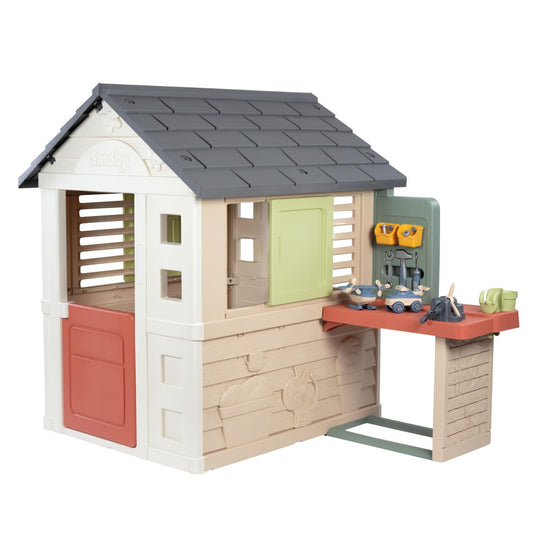 Smoby Life Nature Playhouse with workshop area, featuring wooden design, windows, and outdoor play features for children.