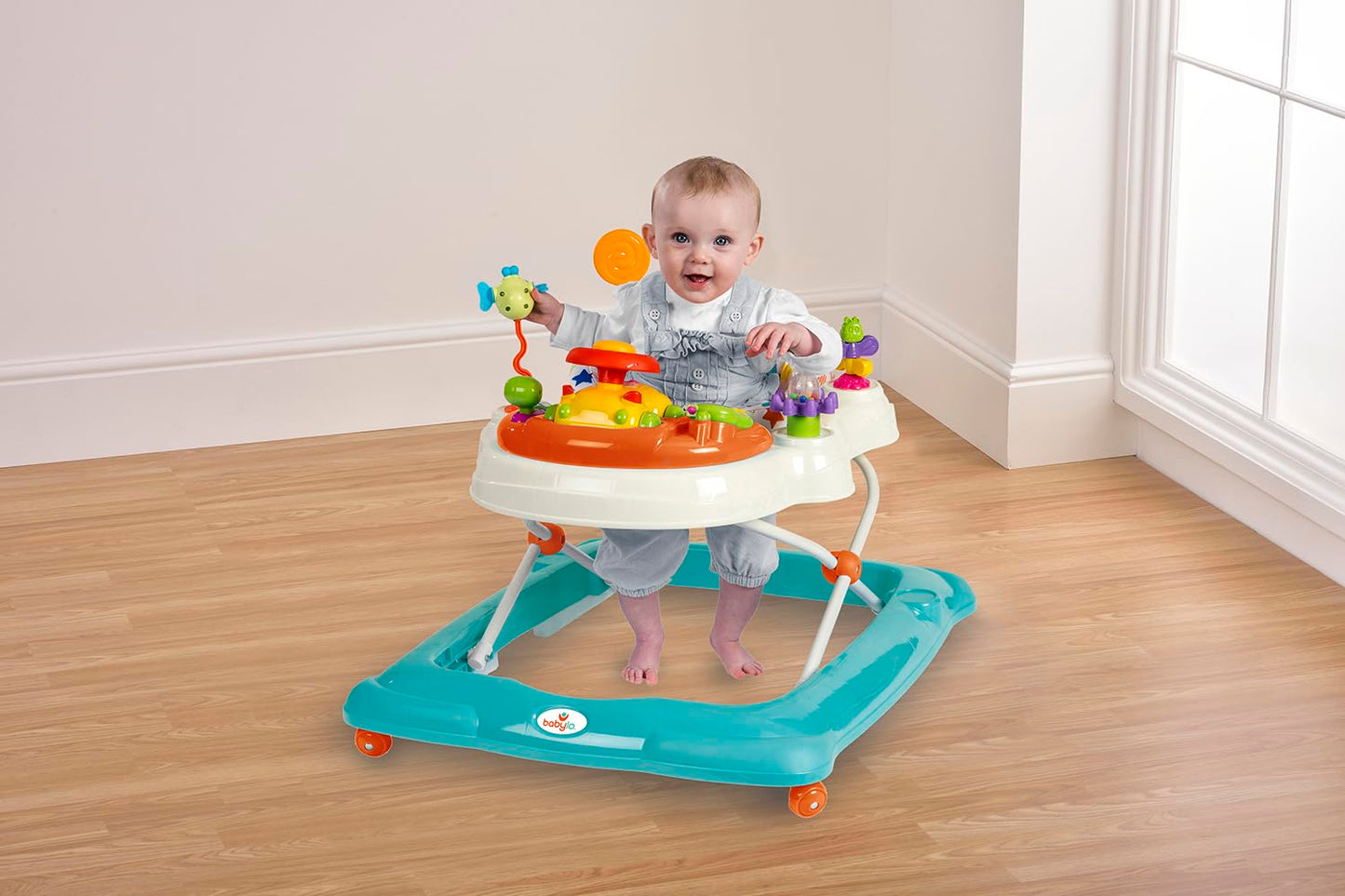 Babylo Twist About baby walker with activities, electronic games, height adjustable feature, and a padded 120-degree swivel seat.