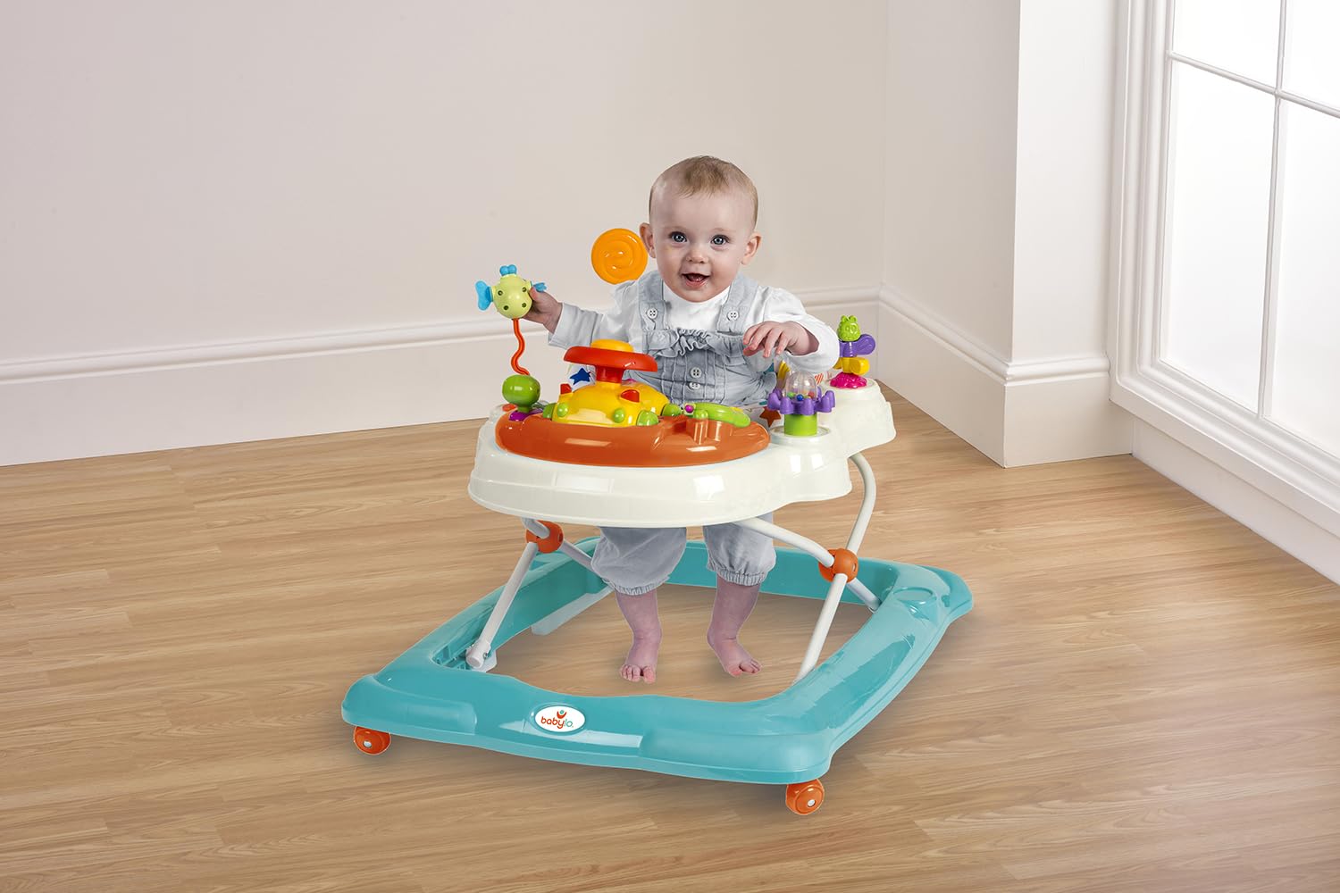 Babylo Twist About baby walker with activities, electronic games, height adjustable feature, and a padded 120-degree swivel seat.