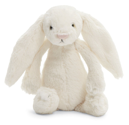 Small 7-inch Jellycat Bashful Cream Bunny stuffed animal with floppy ears and a soft, cuddly body.