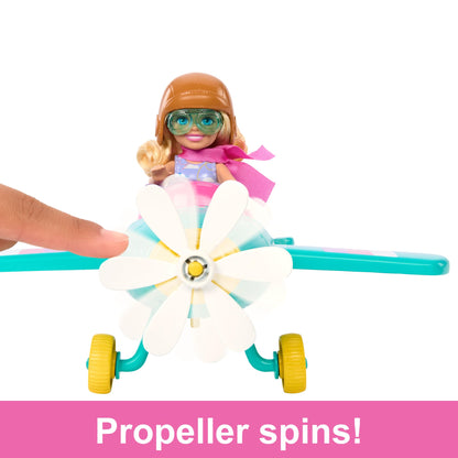 Barbie Chelsea Can Be doll and 2-seater plane playset with spinning propeller, puppy, stickers, and 7 accessories on a white background.