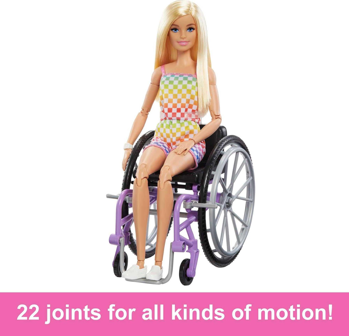 Barbie Fashionistas doll in a rainbow romper, with a wheelchair and ramp, perfect for imaginative play and inclusion.