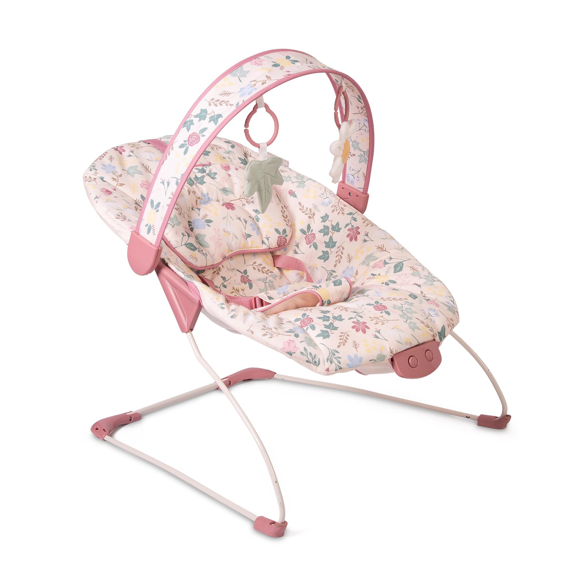 Red Kite Cozy Bounce musical baby bouncer in rose and ivy fabric with soft padding and a hanging toy for infants.