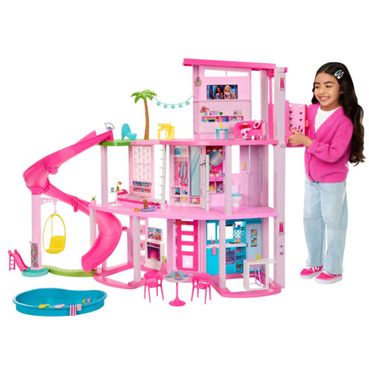 Barbie Dreamhouse with three stories, pool, slide, elevator, and 75 accessories for imaginative play.