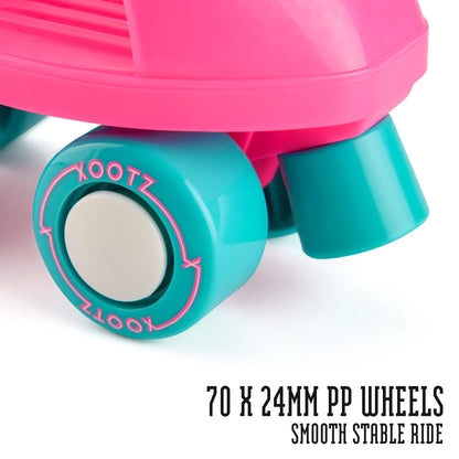 Xootz kids' adjustable quad roller skates with pink and black design, suitable for indoor and outdoor skating for children aged 5+