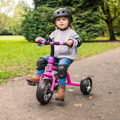 Pink Xootz tricycle for kids, featuring an easy clip design and portable frame, perfect for outdoor play.