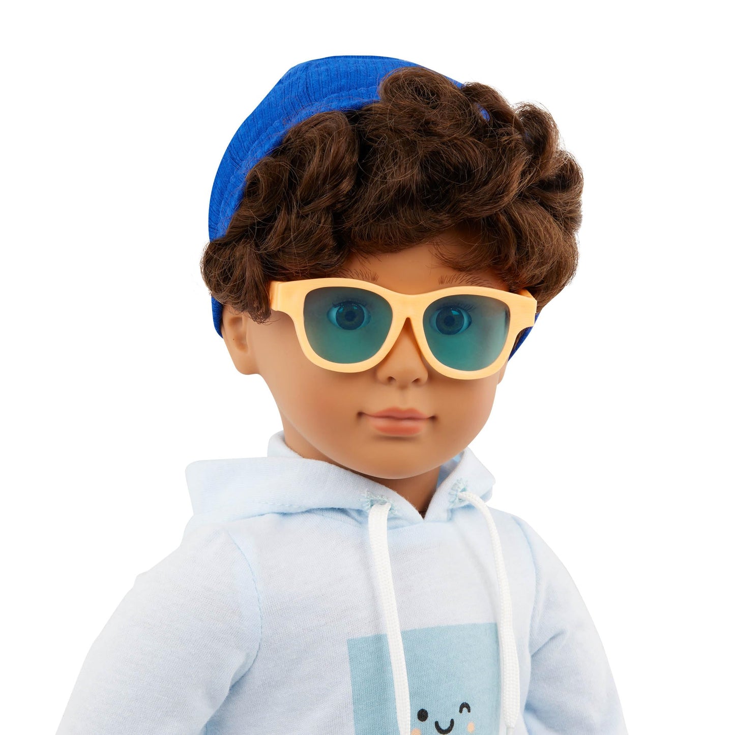 Our Generation Milo Boy Doll with travel accessories, including luggage, sunglasses, and a passport for imaginative play.